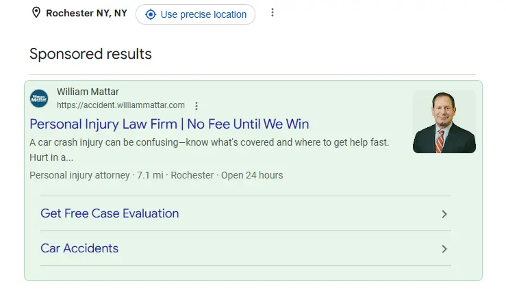Google Ads search results example for an Rochester law firm query