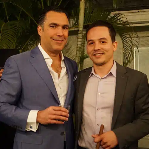 Jorge Argota with Percy Martinez, the founding client